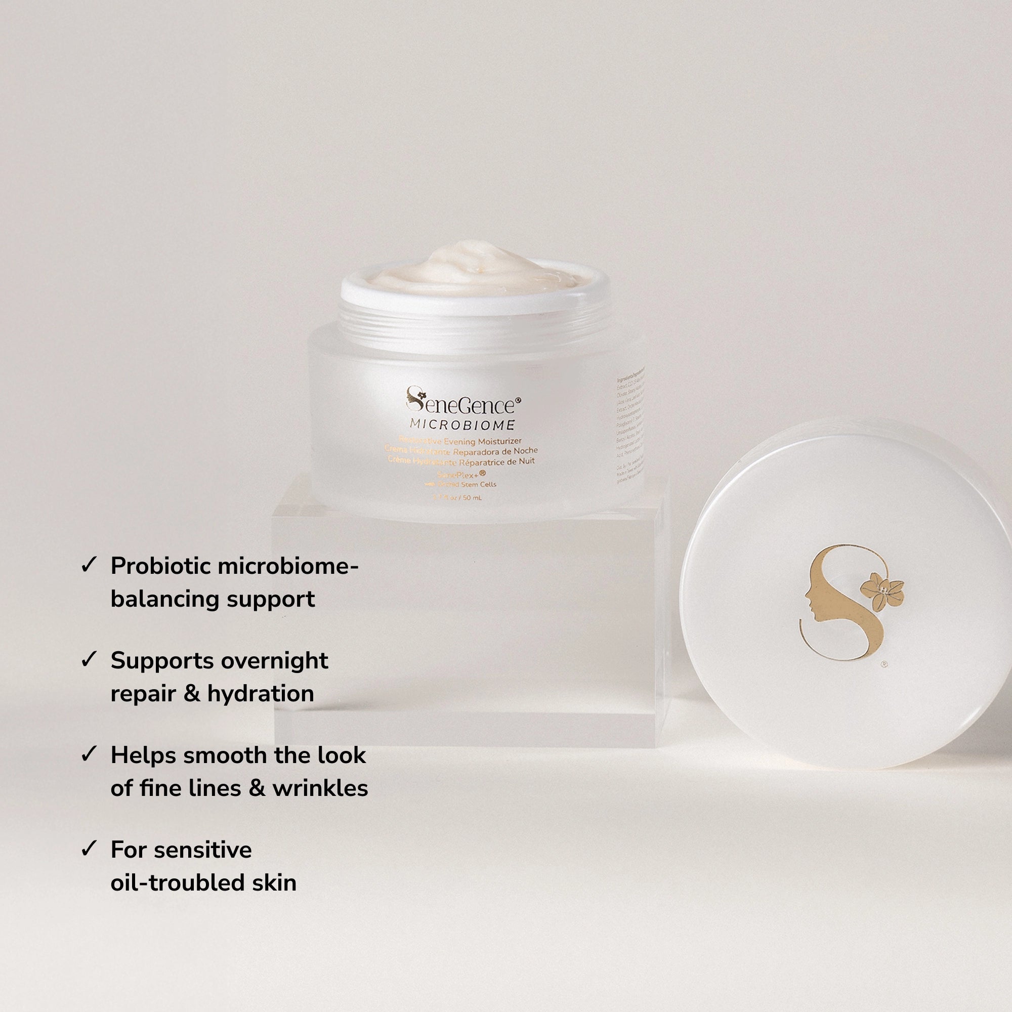 Official SeneGence product image for Microbiome Restorative Evening Moisturizer. The package label reads “SeneGence Microbiome Restorative Evening Moisturizer,” “SenePlex+® with Orchid Stem Cells,” and “1.7 fl oz / 50 mL.” Visible claim bullets read: “Probiotic microbiome-balancing support”; “Supports overnight repair & hydration”; “Helps smooth the look of fine lines & wrinkles”; and “For sensitive oil-troubled skin.”