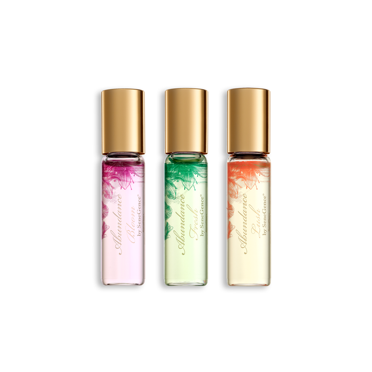 Abundance Parfum Rollerball Travel Trio by SeneGence: Three slim rollerball perfume bottles in pink, green and pale yellow with gold caps.