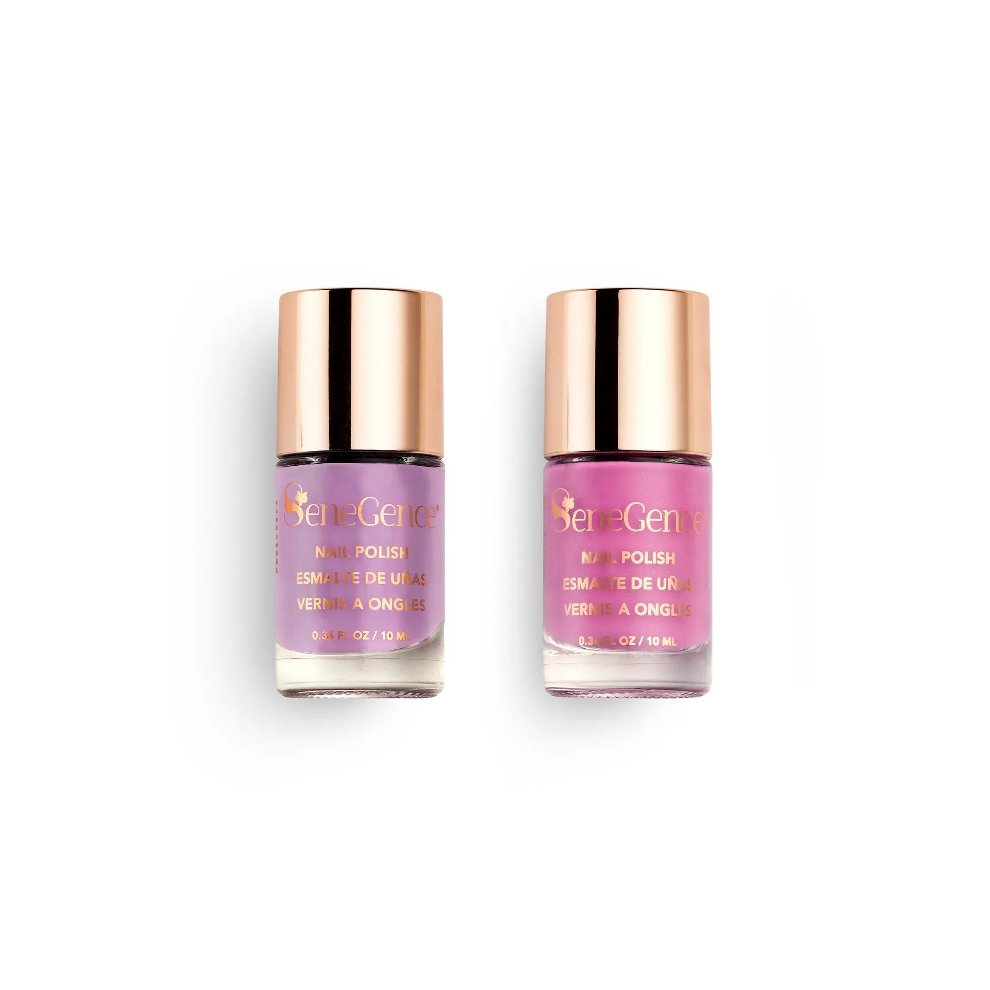 Two gold-capped SeneGence Nail Polish bottles, lilac at left and pink at right, on a white background.