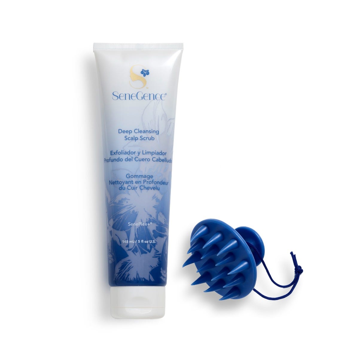 A white-to-blue scalp-scrub tube beside a blue scalp scrubber, Deep Cleansing Scalp Scrub with Scalp Scrubber.