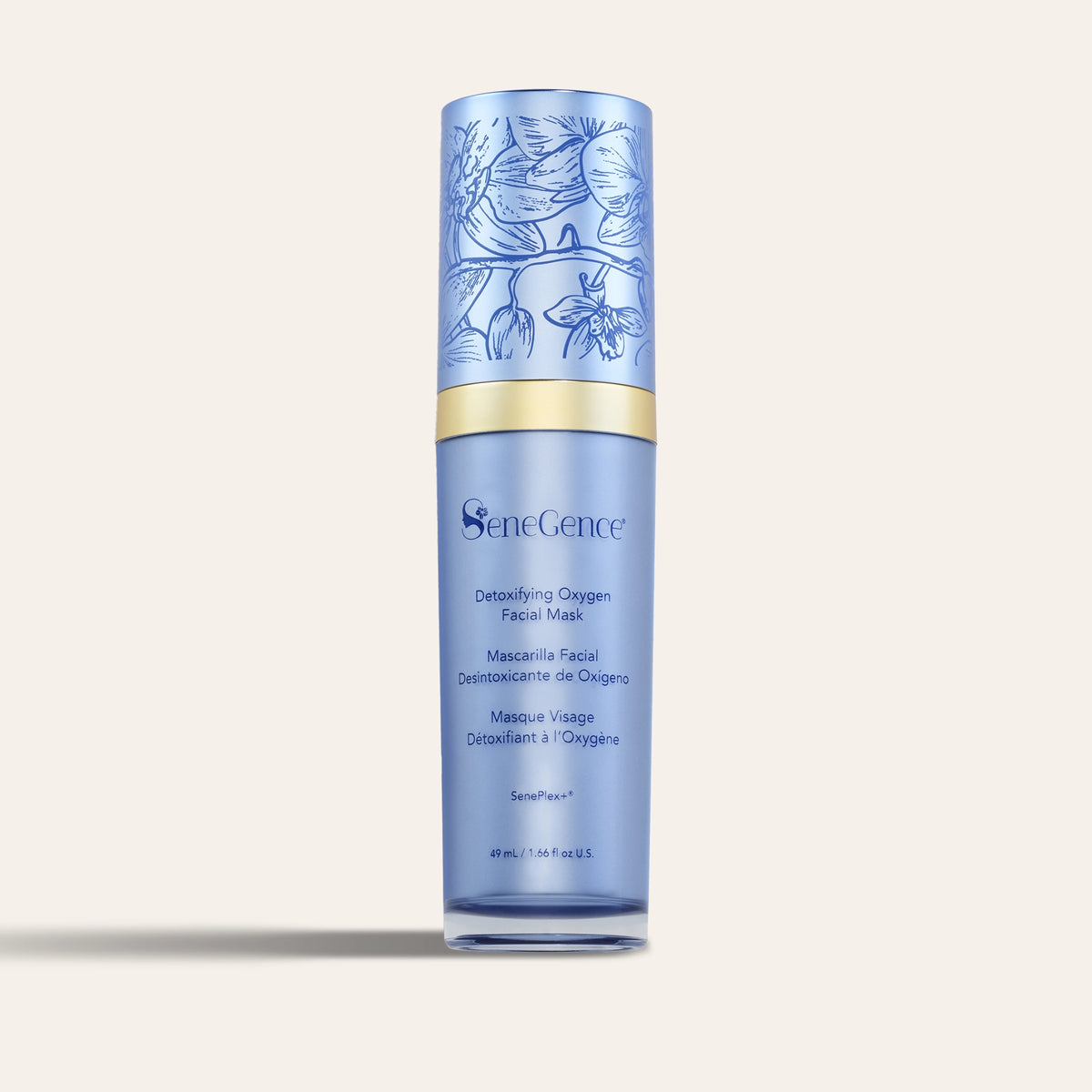 A pale blue bottle with a blue orchid-decorated cap, Detoxifying Oxygen Facial Mask.