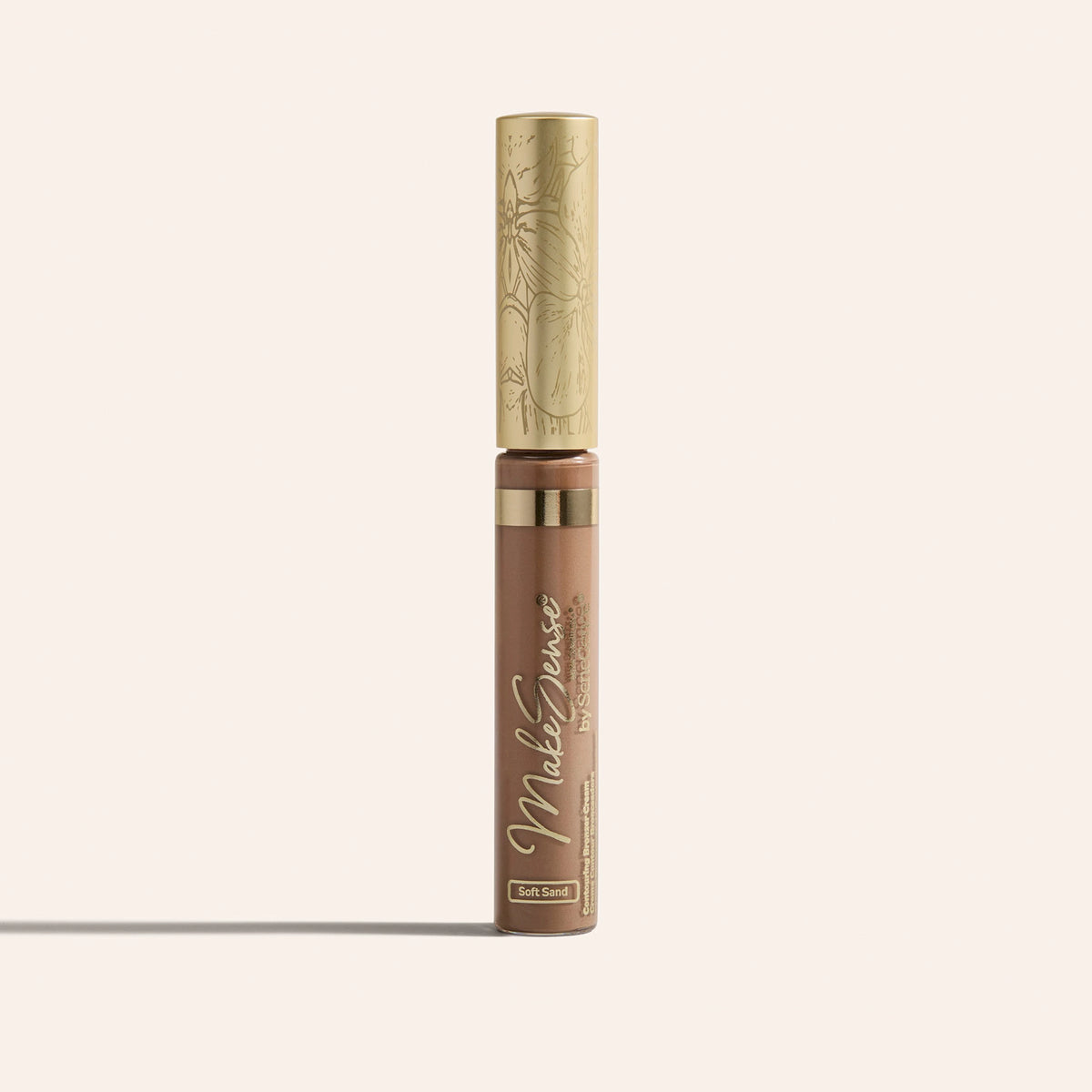 A brown bronzer tube with a gold cap, MakeSense Contouring Bronzer Cream.