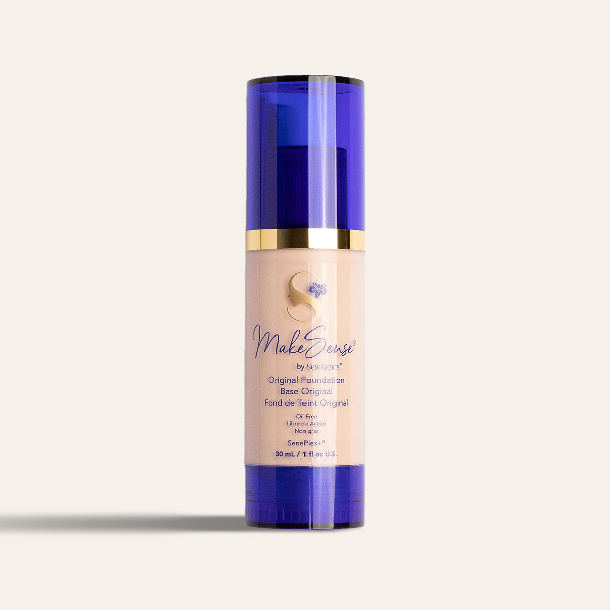 A beige foundation bottle with a blue cap and blue base, MakeSense® Original Foundation.