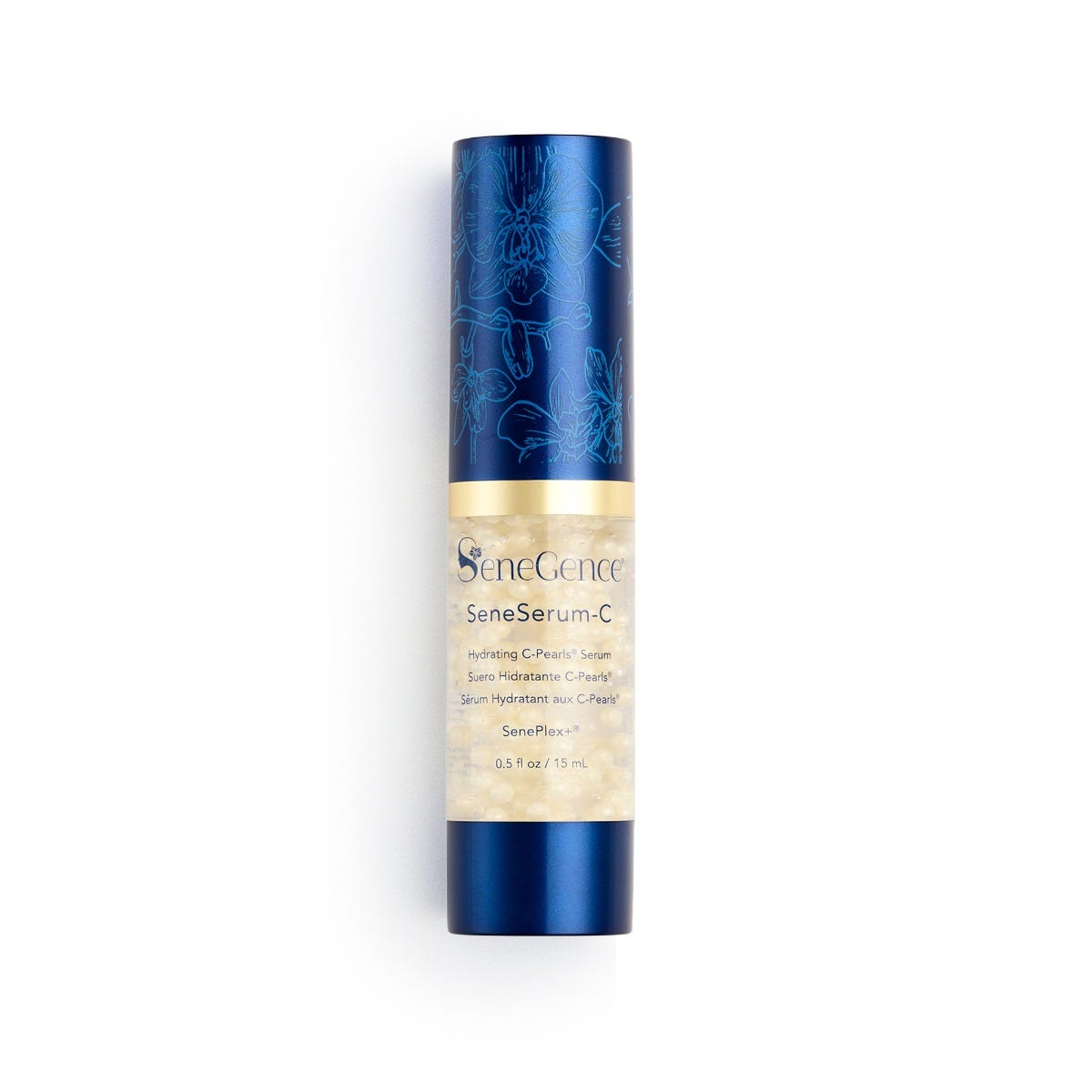 A clear airless serum bottle filled with visible pale-yellow pearls, with a navy cap printed with blue orchid line art, a gold band, navy label text and a navy base, SeneSerum-C® Hydrating C-Pearls® Serum.